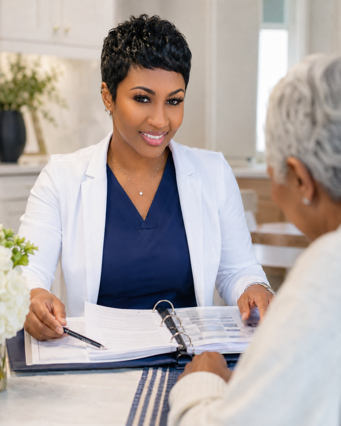Well-organized health binder on a desk, person reviewing documents calmly